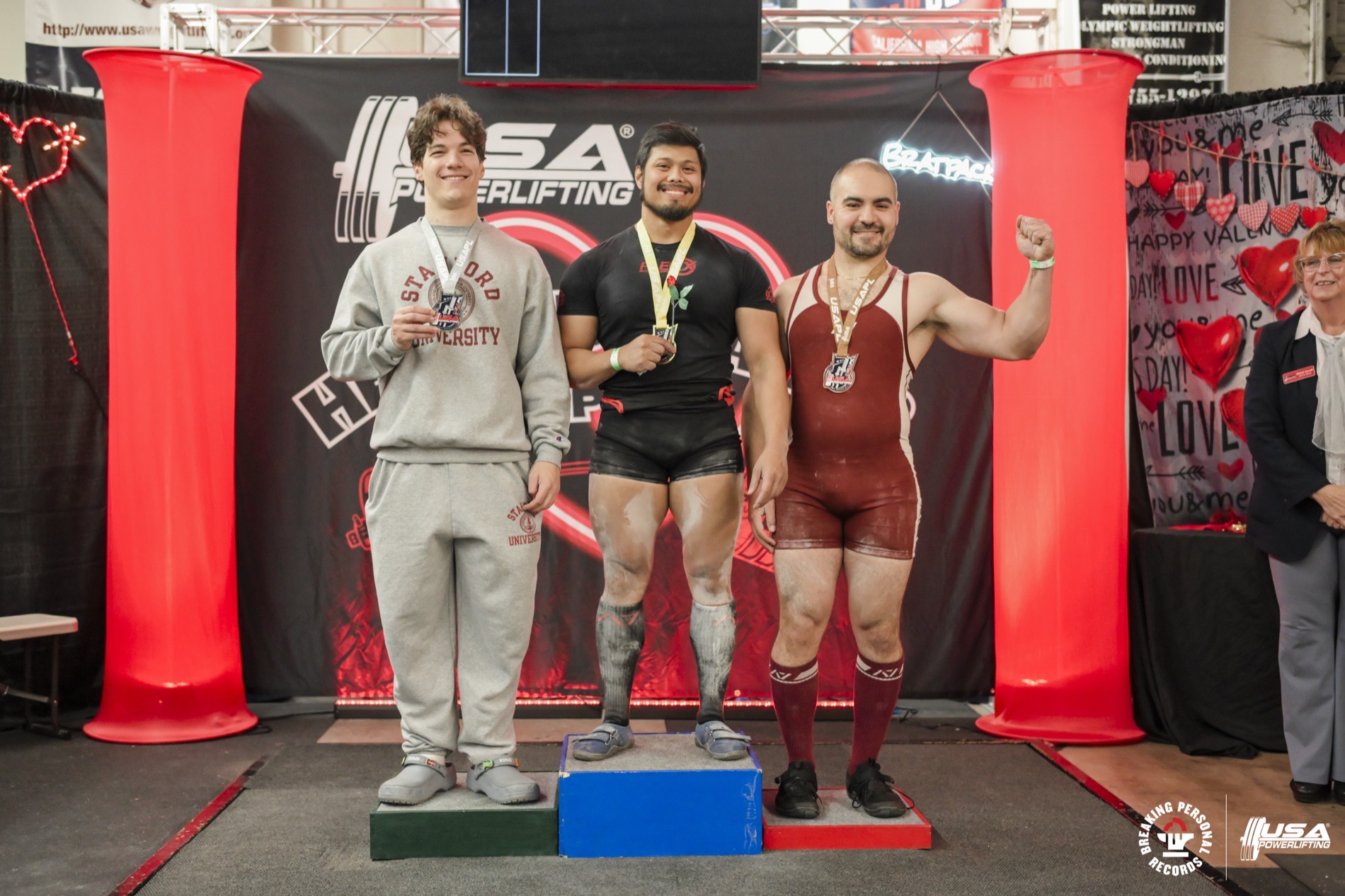 Eric Moseley on the podium at a powerlifting meet